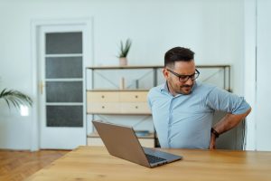 Feeling pain in back.